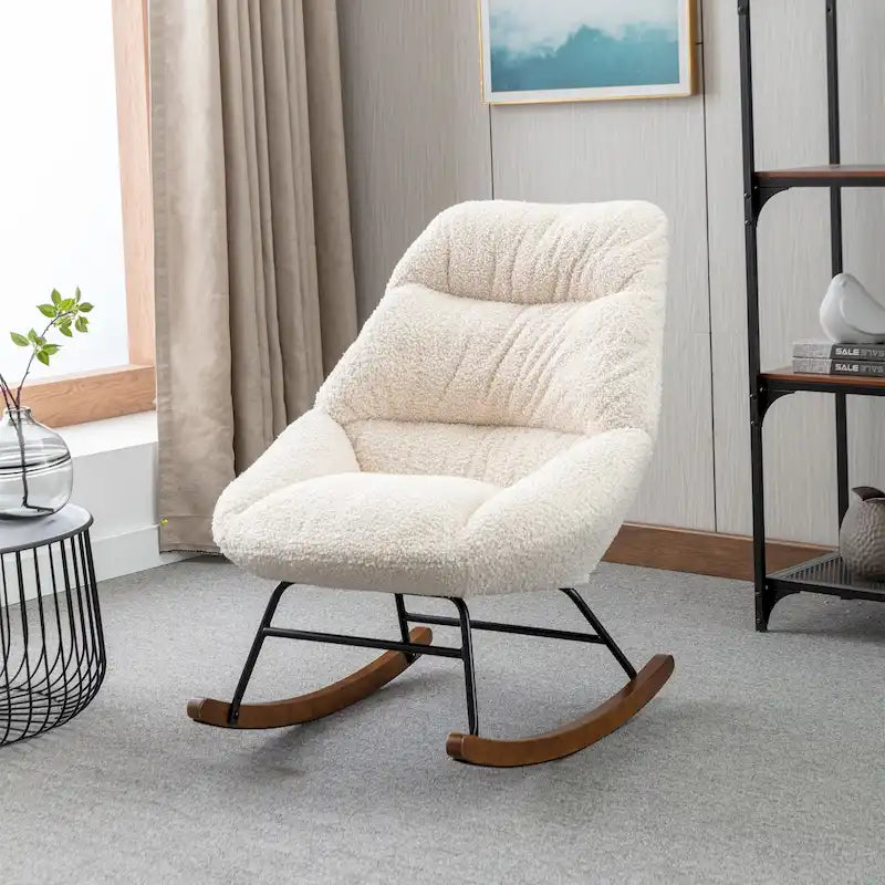 Fauteuil à bascule capitonné