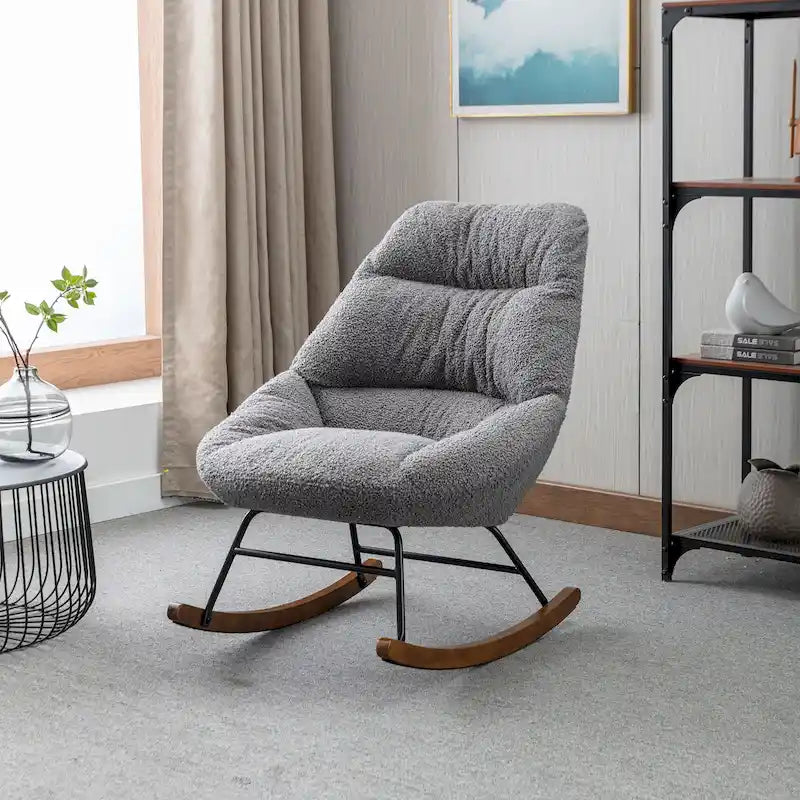 Fauteuil à bascule capitonné