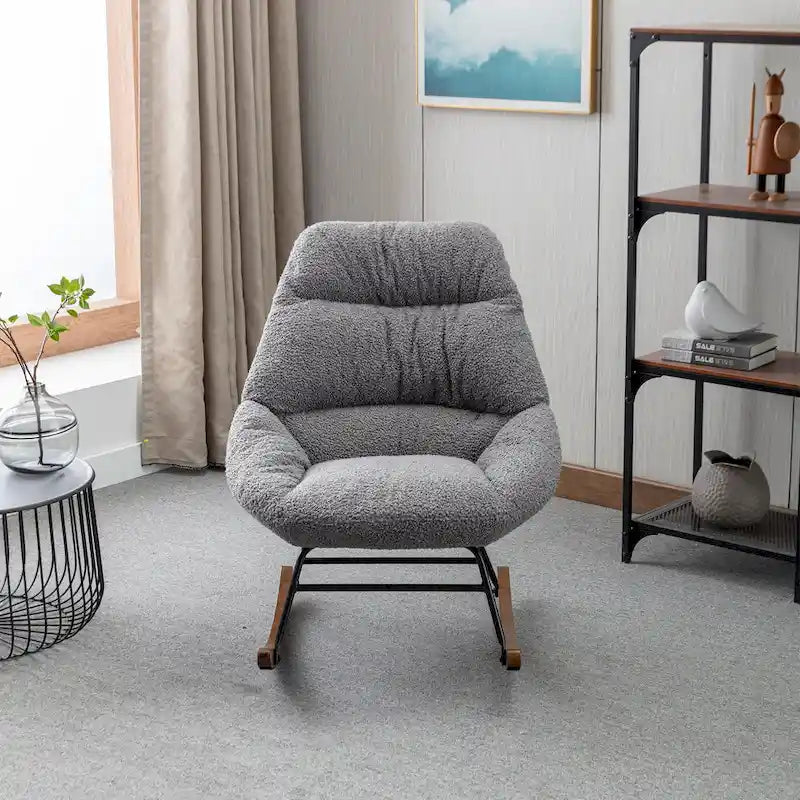 Fauteuil à bascule capitonné