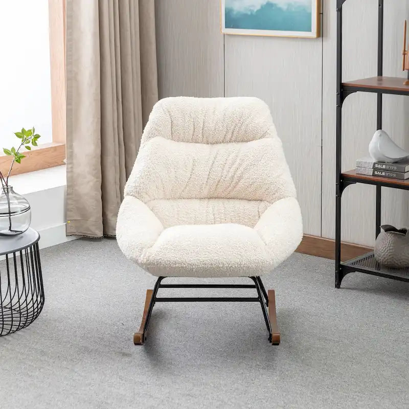Fauteuil à bascule capitonné