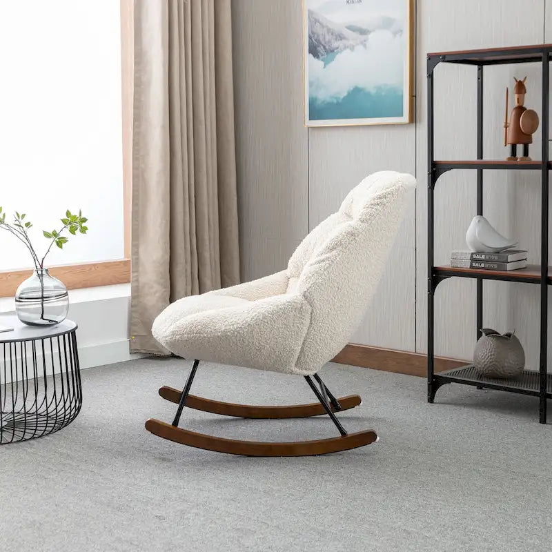Fauteuil à bascule capitonné