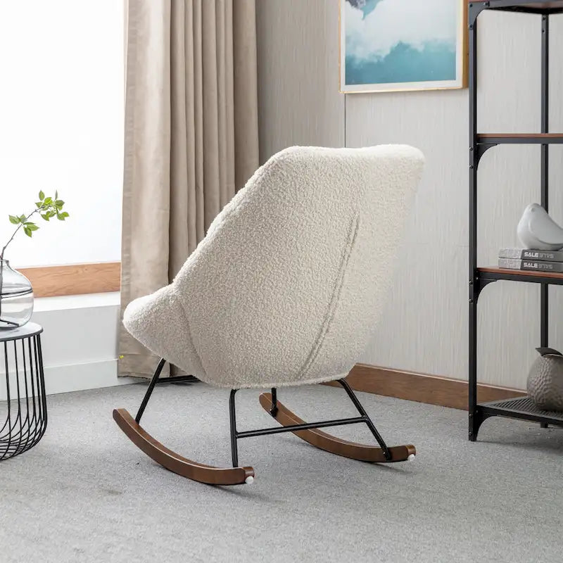 Fauteuil à bascule capitonné