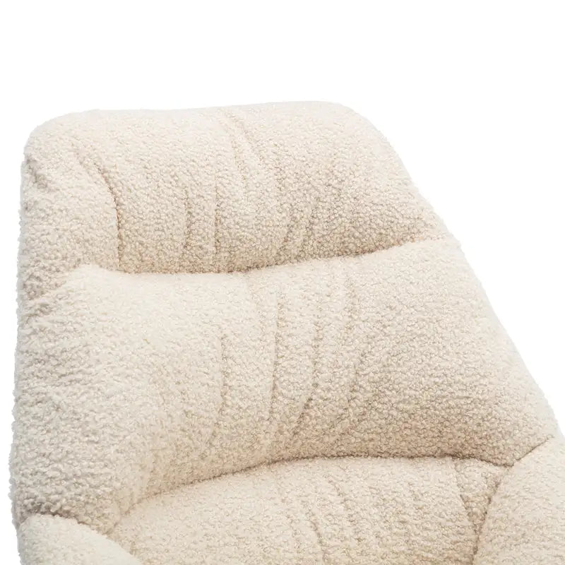 Fauteuil à bascule capitonné