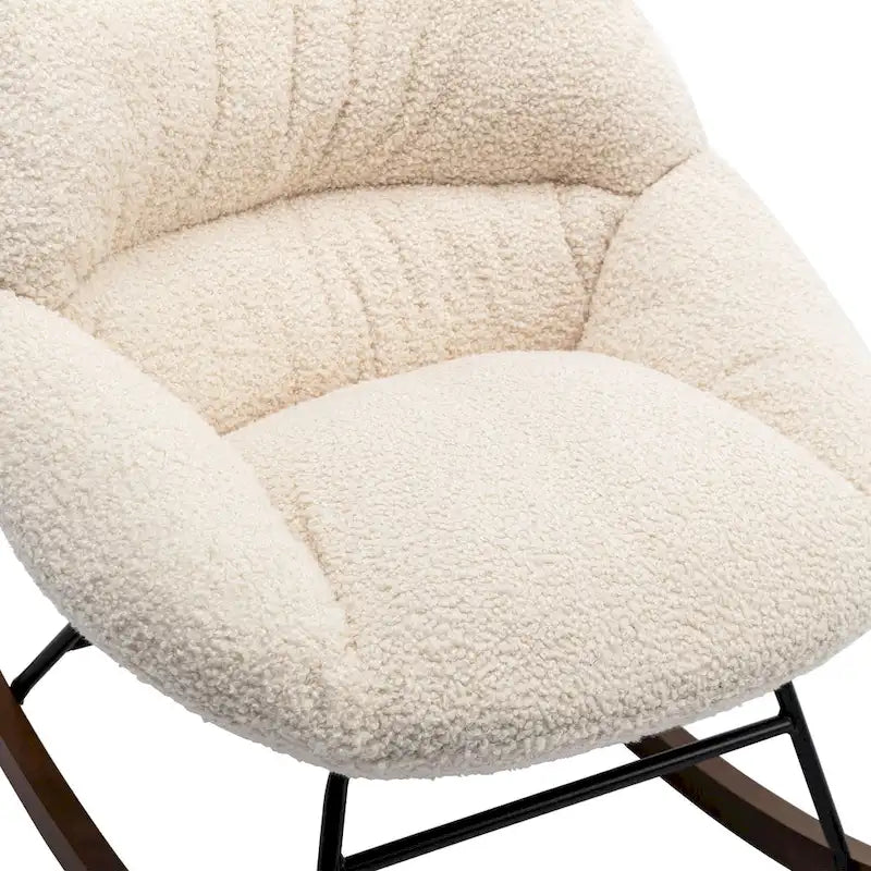 Fauteuil à bascule capitonné