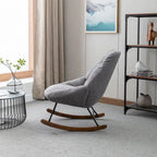 Fauteuil à bascule capitonné