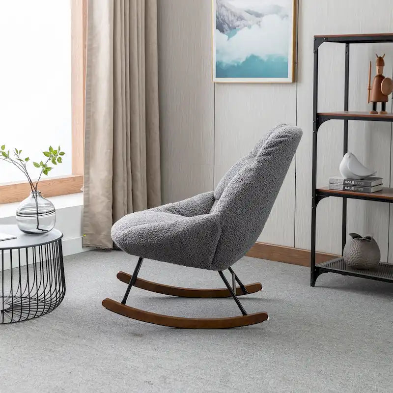 Fauteuil à bascule capitonné