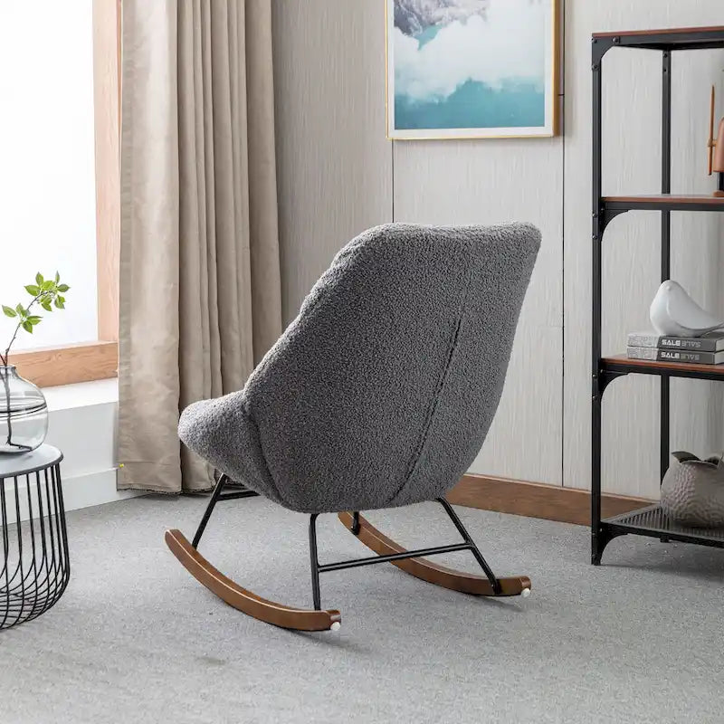 Fauteuil à bascule capitonné