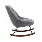Fauteuil à bascule capitonné