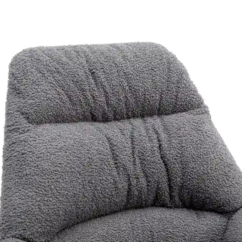 Fauteuil à bascule capitonné