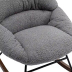 Fauteuil à bascule capitonné