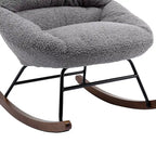 Fauteuil à bascule capitonné
