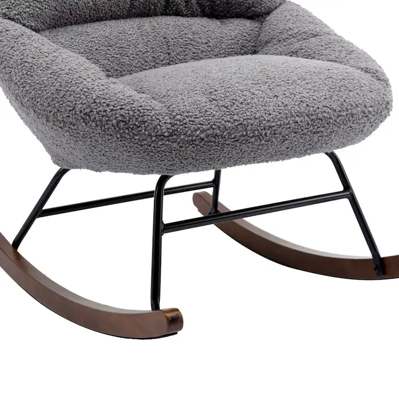 Fauteuil à bascule capitonné