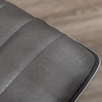 Chaise de bureau sans accoudoirs design côtelée en similicuir gris avec dossier mi-haut et pivotante